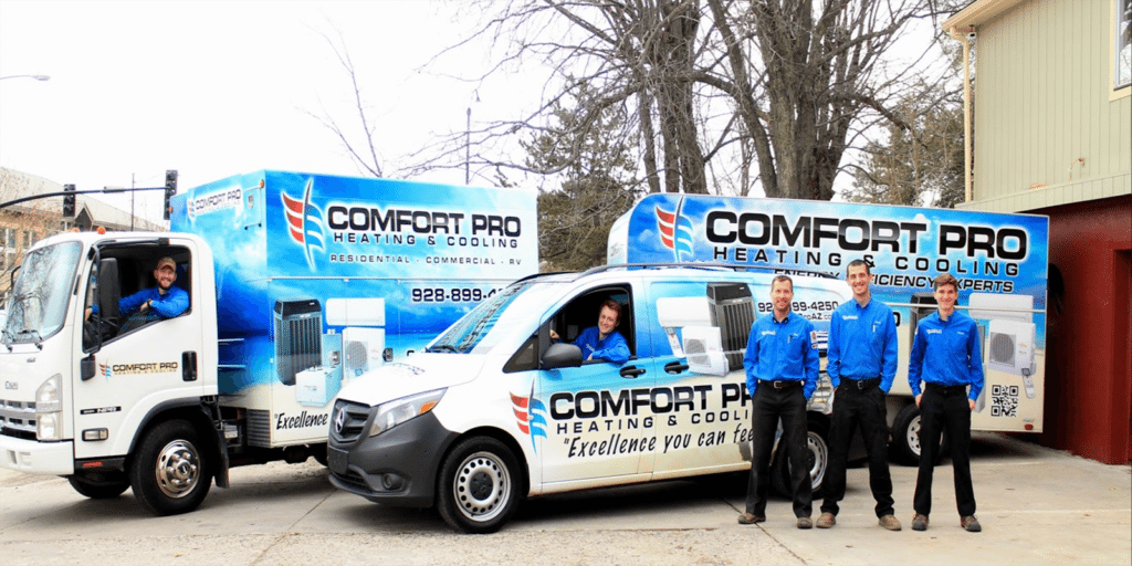 comfort pro heating and cooling team with trucks